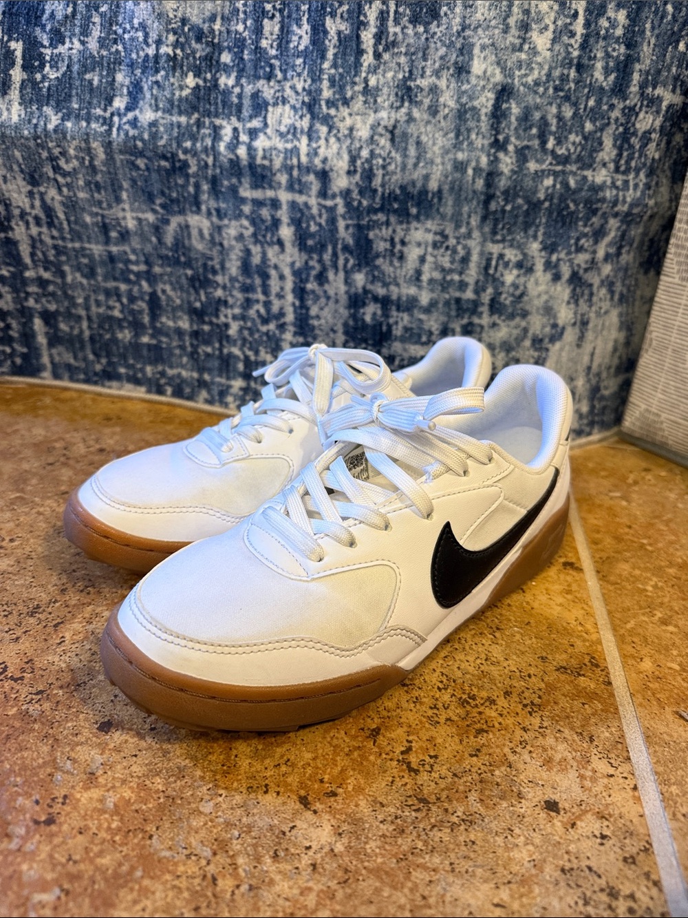 Nike White Sneakers with Black Swoosh and Gum Sole